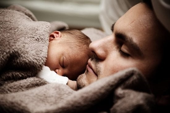 Snuggled Up and Warm Father and Child