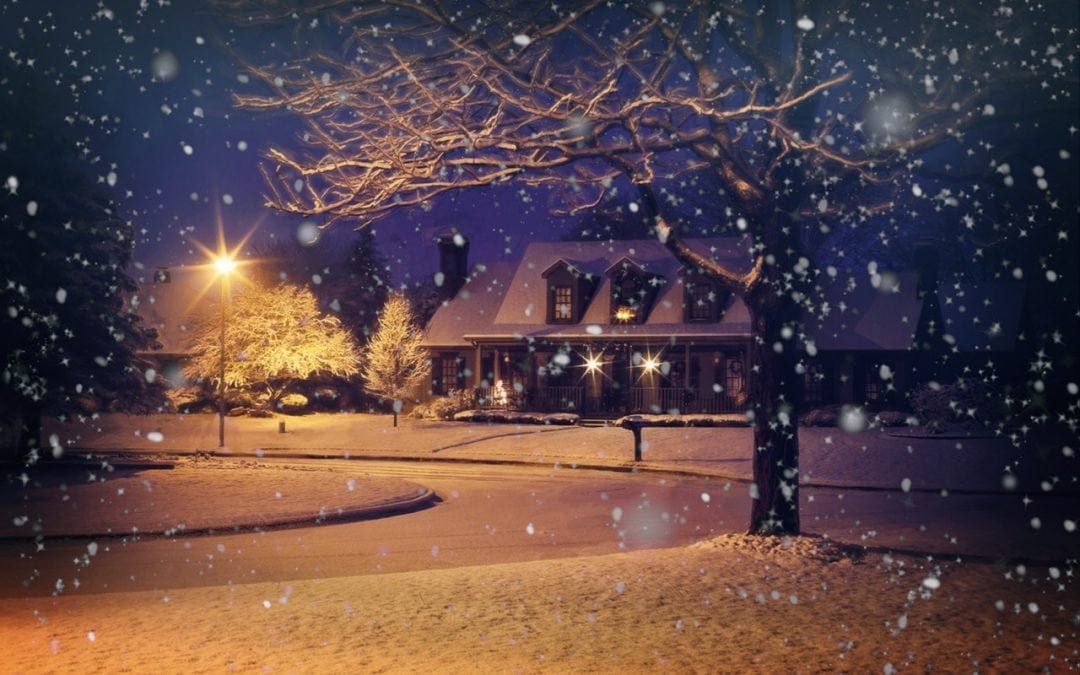 A snowy driveway during wintertime